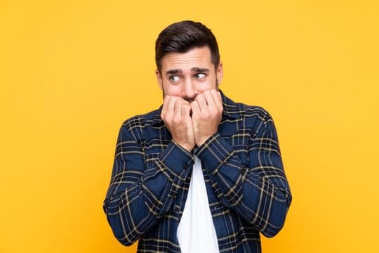 360_F_315064372_airpuxfLyMTVt7LoalcnNGivniYQHRlh Nervous patient with dental anxiety looking worried—The Dentist West Midlands offers gentle sedation dentistry for a stress-free experience